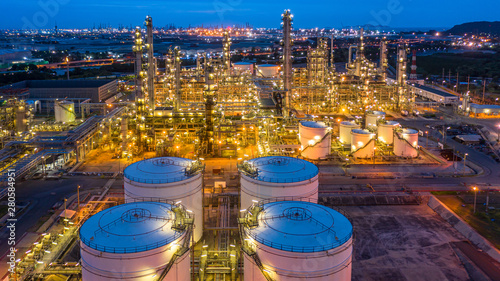 Aerial view petrochemical plant and oil refinery plant background at night, Petrochemical oil refinery factory plant at night.