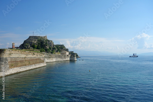 View at Ionian sea in Corfu Town, ships, boats, canyon, old fortress