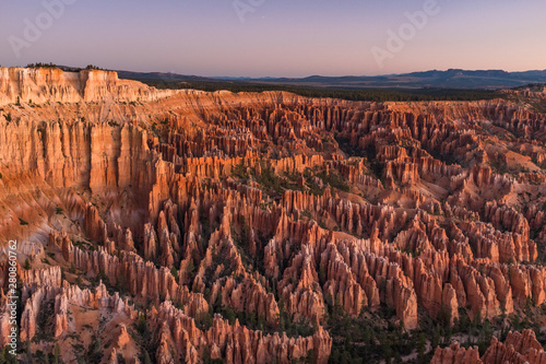 The stunning Bryce Canyon in all its glory before sunrise, amazing limestone hoodoo with various shades of oranges and reds.