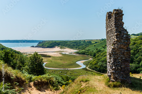 The beach at 3 Cliffs Bay viewed from Pennard Castle in the Gower, Wales