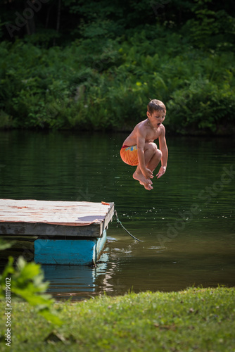 Childhood fun cannonball pond jumping