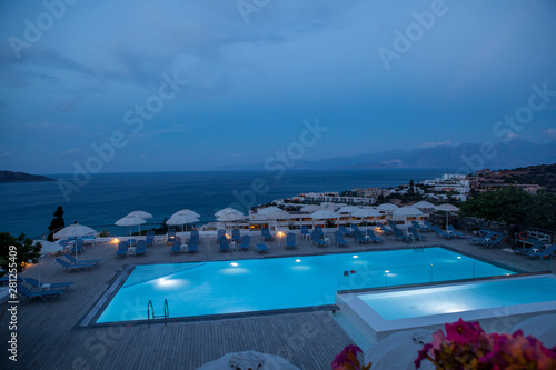 Night pool area in the hotel. Crete, Greece.