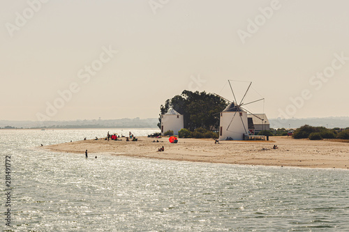 Alburrica windmills, estuary river windmills, landscape, Portugal