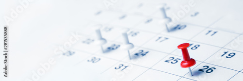 Tacks On Calendar Page/Business Concept
