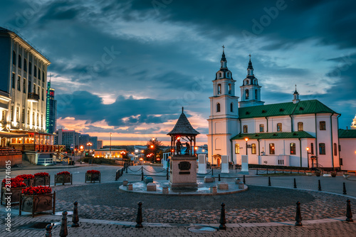 Minsk, Belarus. Illuminated Cathedral Of Holy Spirit In Minsk At Evening Or Night Street Lights . Famous Landmark. Main Orthodox Church Of Belarus At Evening.