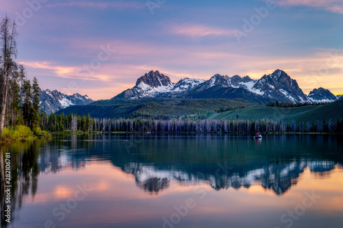 Fishing boat in Little Redfish Lake in Idaho at sunset