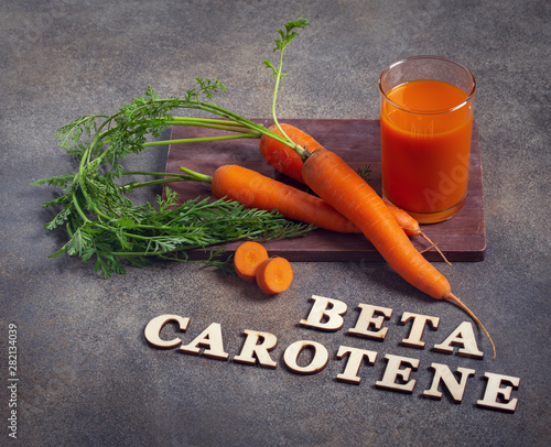 Beta carotene text and carrot juice