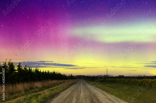 Aurora Australis, Southern Lights Night Sky Landscape With Stars Over Rural Road Near Christchurch, New Zealand