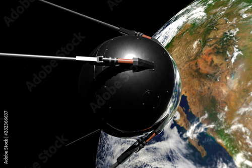 Satellite Sputnik 1 in space against the earth.