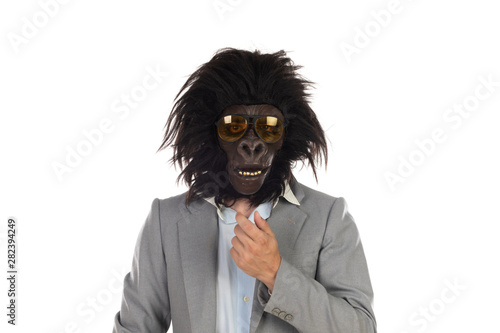 Businessman with gorilla head gesturing