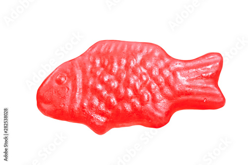 Isolated red fish-shaped jelly. Jellyfisk with strawberry flavor. Typical norwegian and swedish sweets called Jordbærfisker.