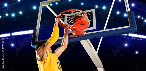 Man basketball player. Dunk. Number 23