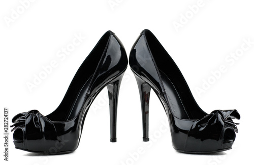 Photo of elegant modern female's black shoes
