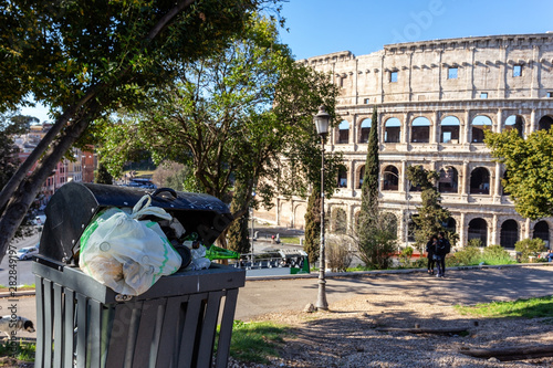 Accumulation of garbage in a park near the Coliseum. Italy, Rome pollution.