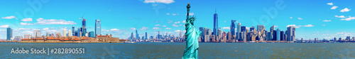 Panorama of The Statue of Liberty with the One world Trade building center over hudson river and New York cityscape background, Landmarks of lower manhattan New York city.
