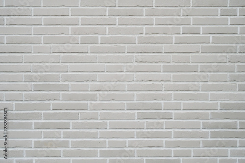 gray clinker brick wall background - modern building exterior with brick slip cladding
