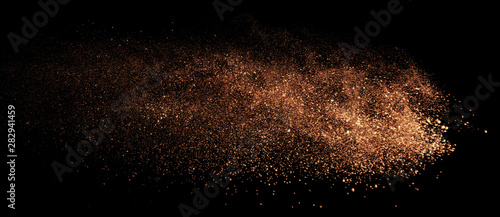 a shot from a firearm, an explosion of gunpowder on a black background, a bright flash with flying particles, abstract shape