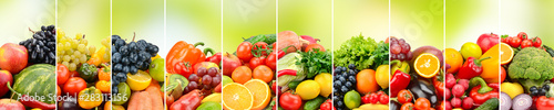 Fruits, vegetables and berries on green background