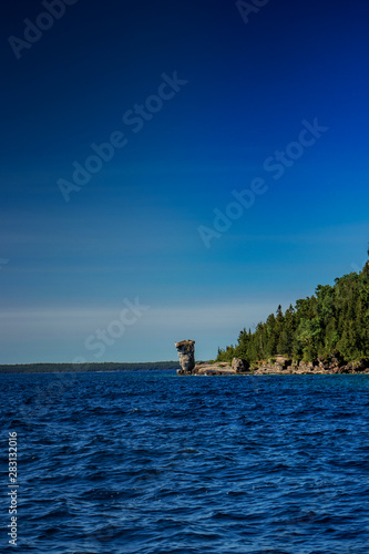 Flower pot rock formation seen from a distance, Lake Huron, ON