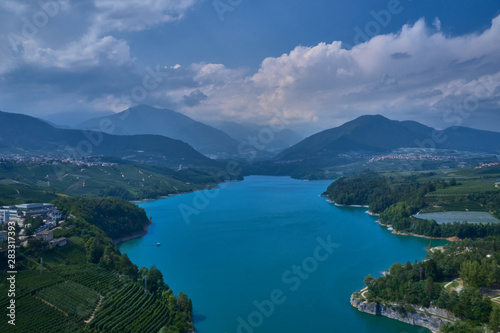 Aerial view Lake Santa Giustina, Castel Cles, bridge over the lake. North of Italy.