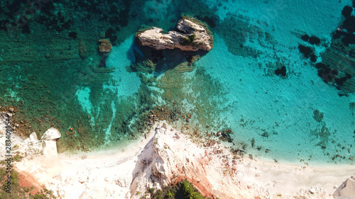 Aerial drone photo of iconic white rock cliffs and volcanic formations near famous beach of Platys and Makrys gialos with turquoise clear sea, Argostoli, Cefalonia island, Ionian, Greece