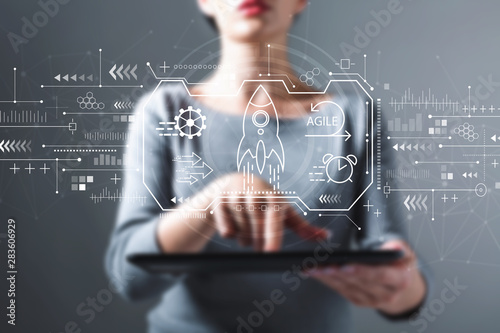 Agile concept with business woman using a tablet computer