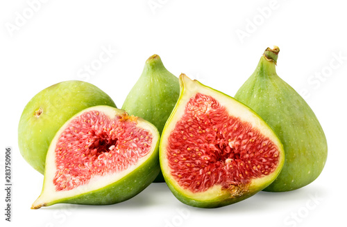 Green figs and two red halves close up on a white background.