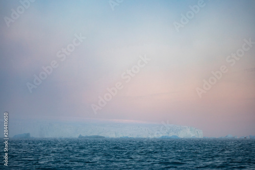 Norway, Svalbard, Kvitoya. Glacier in fog at sunrise. Credit as: Josh Anon / Jaynes Gallery / DanitaDelimont.com