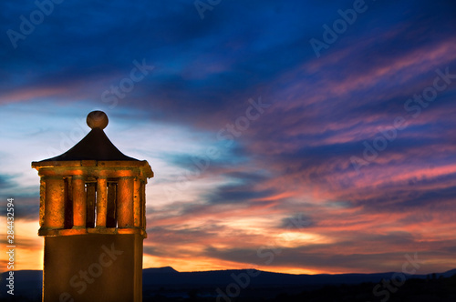 Mexico, San Miguel de Allende. Sunset over building tower. Credit as: Nancy Rotenberg / Jaynes Gallery / DanitaDelimont.com