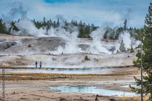 Couple enjoying Norris Geyser Basin, Yellowstone National Park