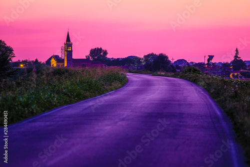 Rovigo, Italy - July, 26, 2019: landscape with the image of a road in Italy at sunset
