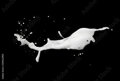 White foam bubble soap shampoo splash explosion in the air on black background,freeze stop motion photo object design