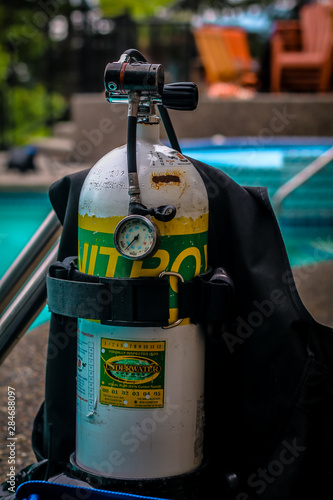 Scuba Tank Beside Pool