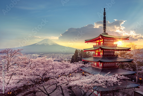 Fujiyoshida, Japan Beautiful view of mountain Fuji and Chureito pagoda at sunset, japan in the spring with cherry blossoms