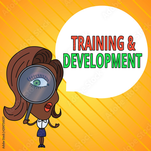 Text sign showing Training And Development. Business photo text learn specific knowledge to improve perforanalysisce Woman Looking Trough Magnifying Glass Big Eye Blank Round Speech Bubble