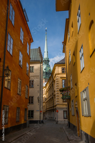 Narrow alleys in the old town Gamla Stan in Stockholm a summer day.
