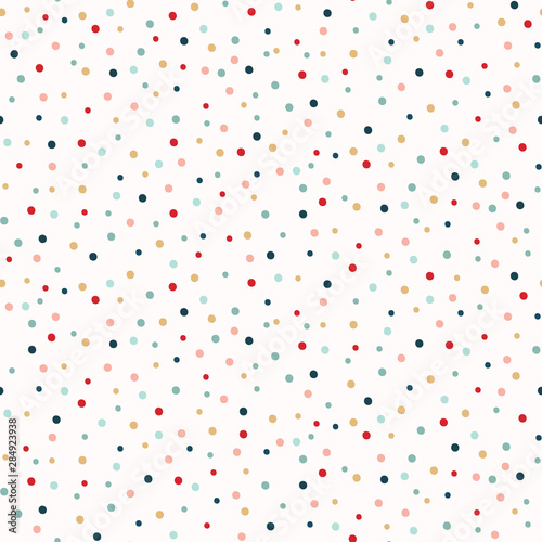 Hand drawn tiny tossed polka dot confetti seamless pattern. Traditional red green holiday all over print. Vector swatch