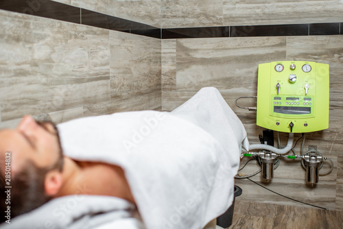 Man before the hydrocolonotherapy in the SPA salon