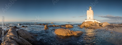 Wide angle panoramic image of the Stompneusbaai lighthouse near Shelley point in town of St Helena Bay on the West coast of South Africa