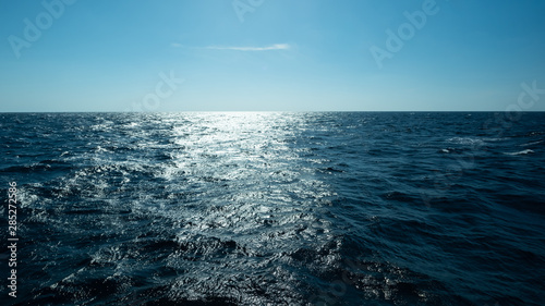Horizontal and sea water surface, Dark blue ocean water for natural background