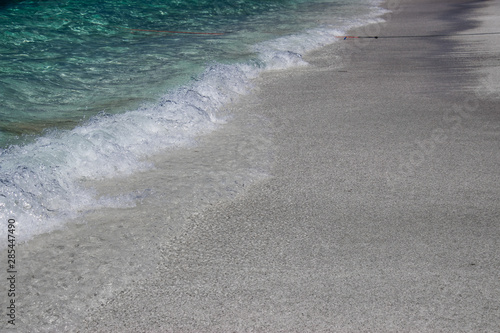 waves on the sand - Mari Ermi Sardegna