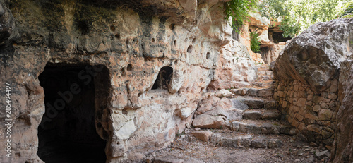 Panoramic view of some ancient buildings in Cava d'Ispica, in Sicily, Italy.