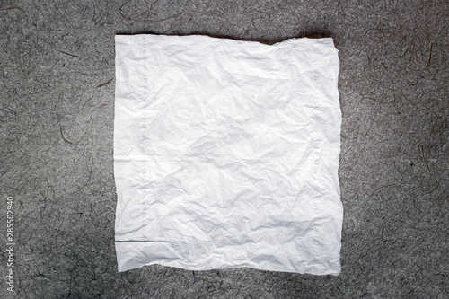 Blank crumpled paper napkin texture and background for design with copy space; black and white tone.