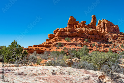 USA, Utah, Grand County, Arches National Park, Klondike Bluffs. A view of sandstone hoodoos and rock fins along Tower Arch hiking trail.