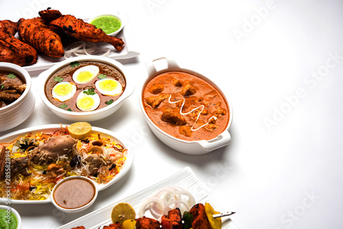 Assorted Indian Non Vegetarian food recipe served in a group. Includes Chicken Curry, Mutton Masala, Anda/egg curry, Butter chicken, biryani, tandoori murg, chicken-tikka and naan/roti