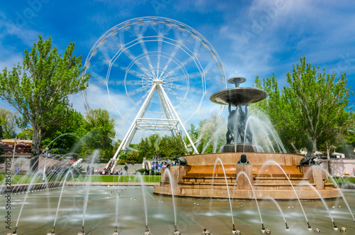 Rostov-na-Donu, Theatre square famous fountain with Atlants and Ferris wheel