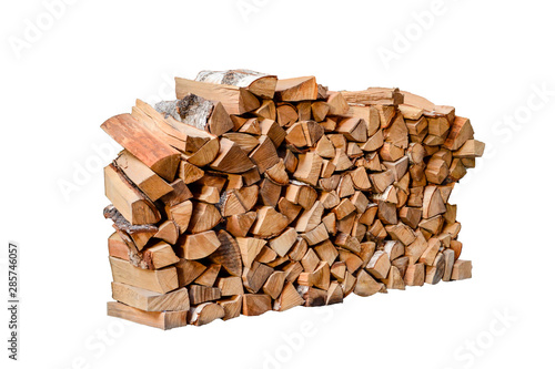 Stacked firewood isolated on white background.