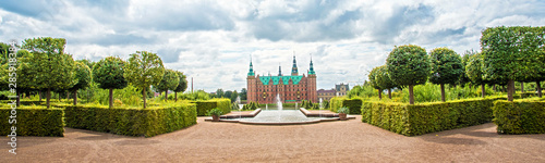 beautiful landscape with fountain and magical incredible gardens and park Frederiksborg slot Castle near Copenhagen. Hillerod, Denmark. Exotic amazing places. Popular tourist atraction.