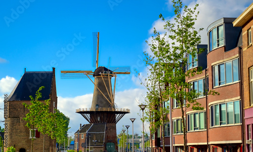 A windmill in the city of Delft in The Netherlands on a sunny day.
