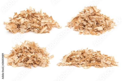 Pile of sawdust piles on white background